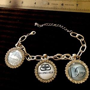 Silver tone linked tray charmed bracelet